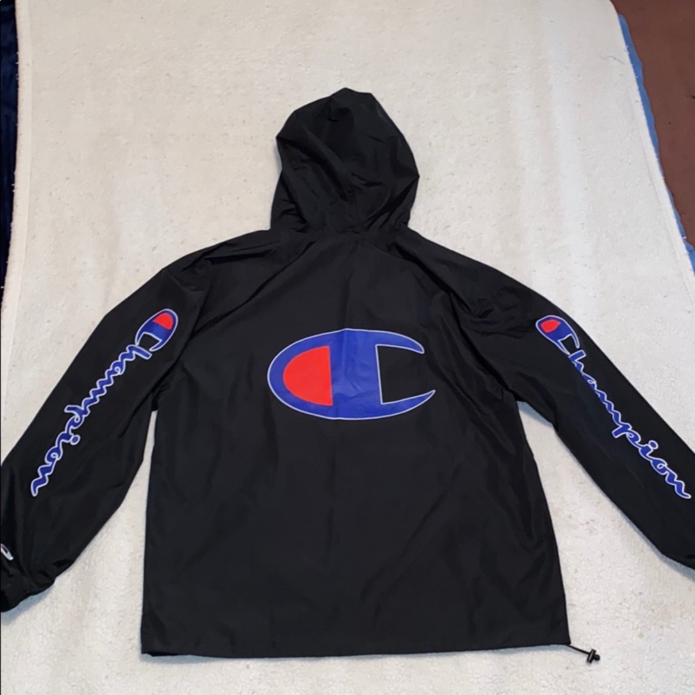 “CHAMPION” 3/4 zip up windbreaker. Color: Black